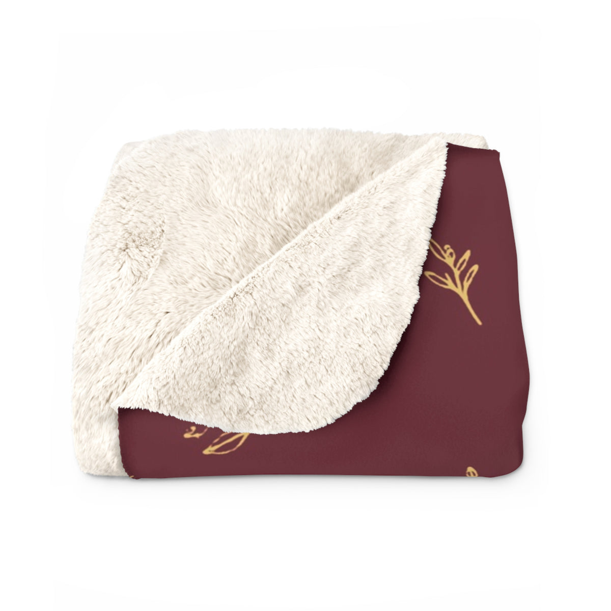 Cranberry Gold sherpa blanket folded to show the cream sherpa back