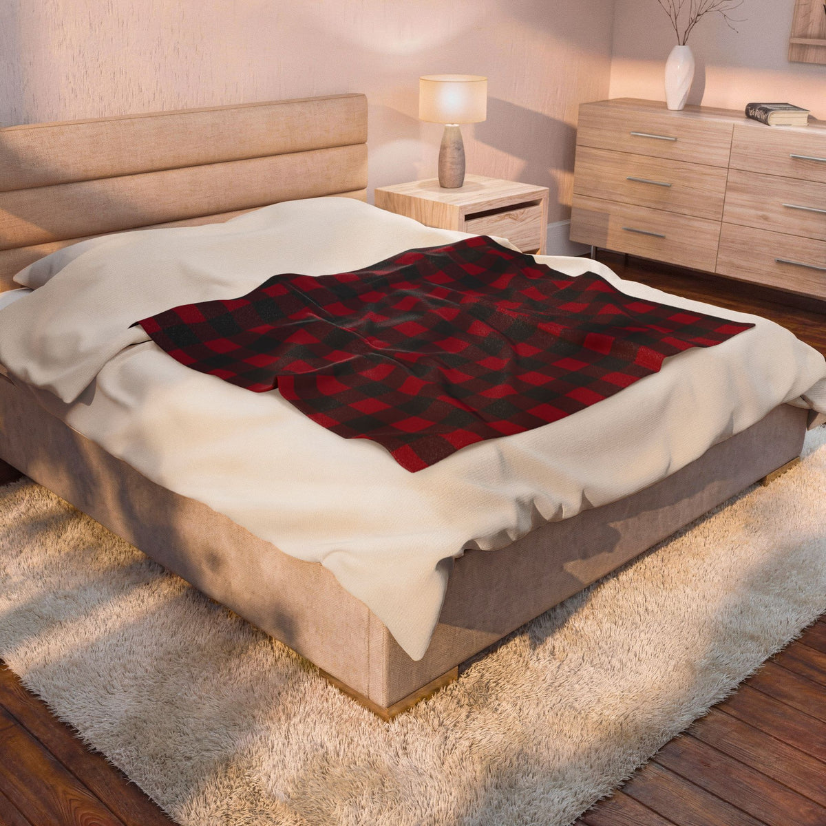 Cranberry Buffalo Check plush blanket draped over a bed in a bedroom
