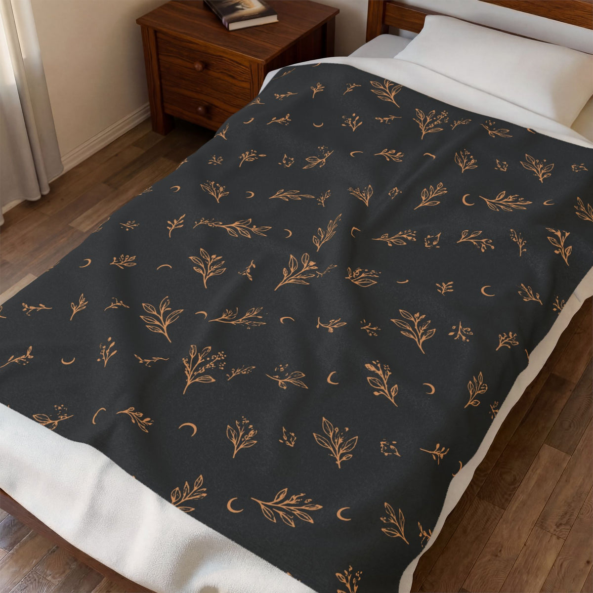 Charcoal Copper plush blanket spread across a bed