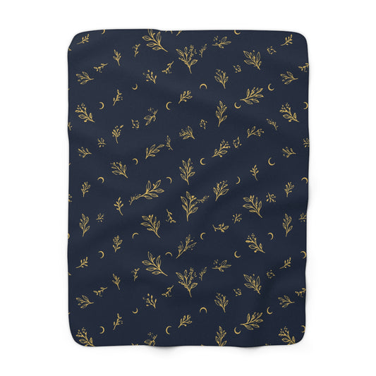 Navy Gold sherpa blanket, 50" × 60": deep navy with gold botanical sprigs and crescent moons