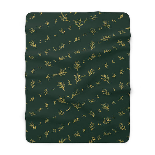 Botanical Gold sherpa blanket, 60" × 80": deep green with gold botanical sprigs and crescent moons