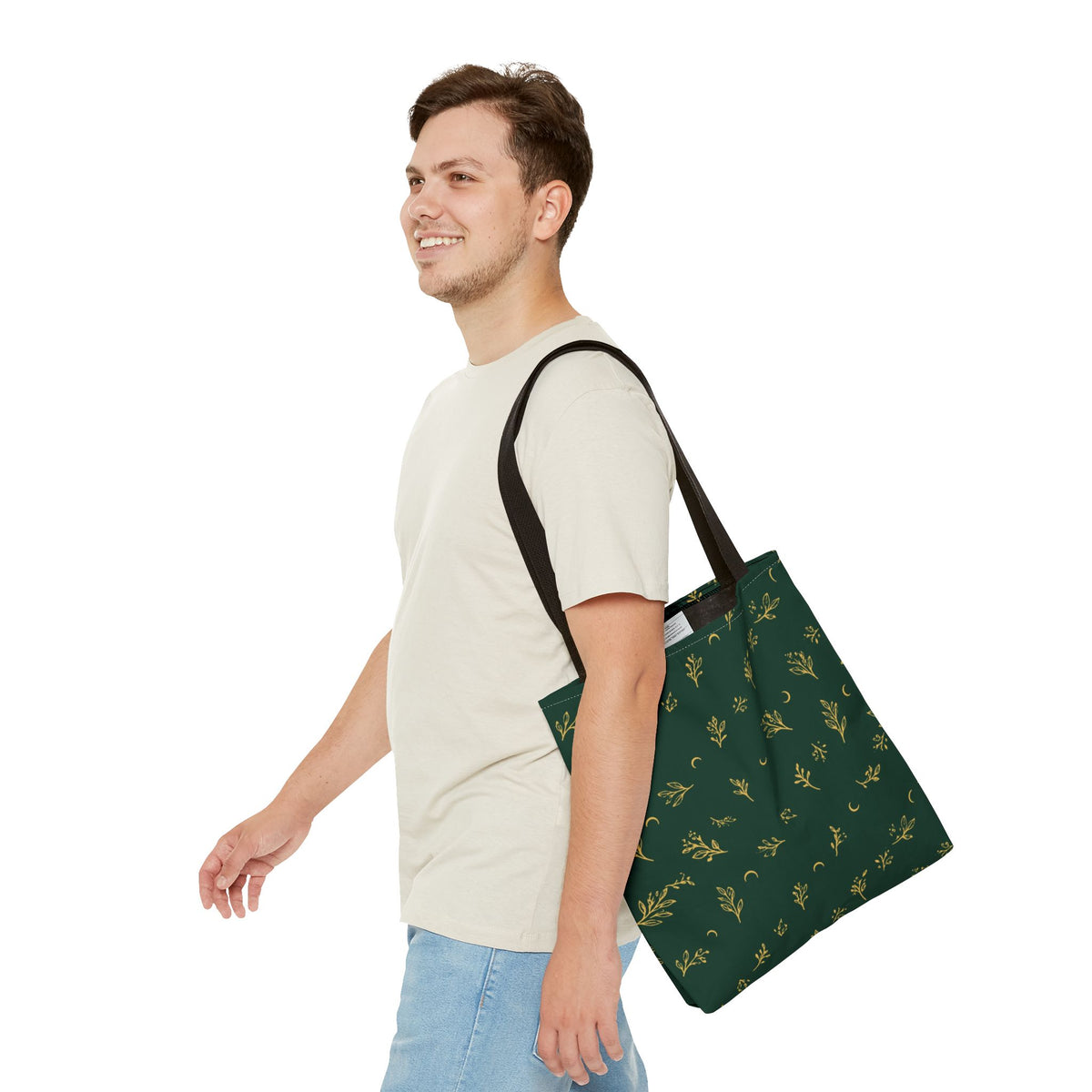 Botanical Gold tote bag, 16" × 16": carried by a person, showing its size