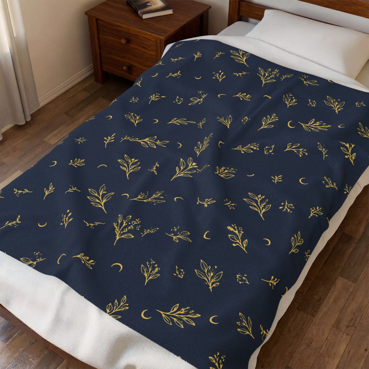 Navy Gold plush blanket spread across a bed