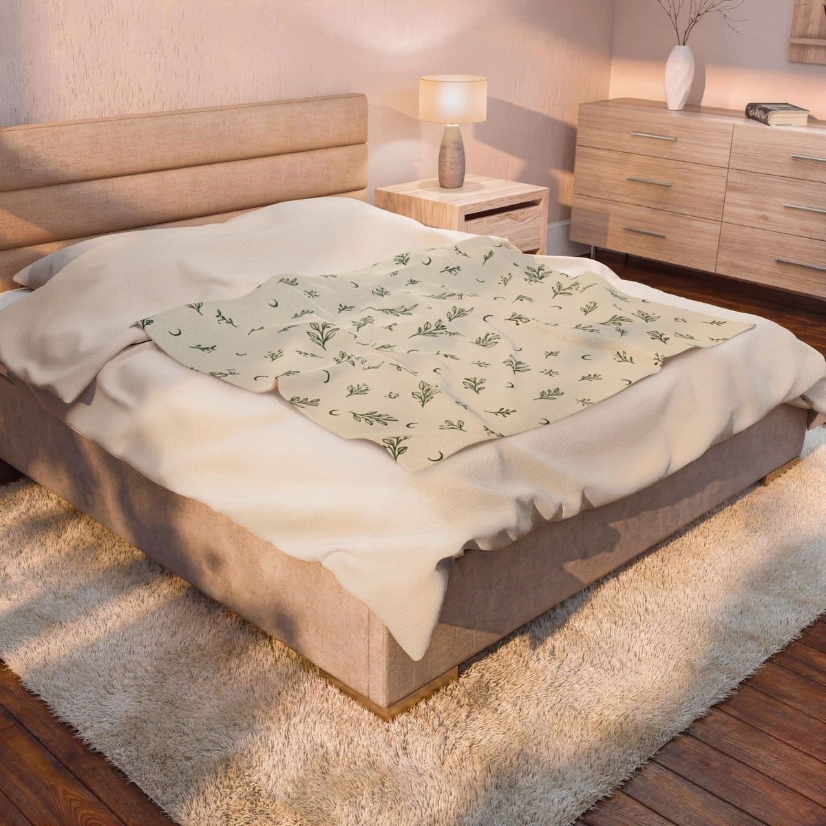Cream Sage plush blanket draped over a bed in a bedroom