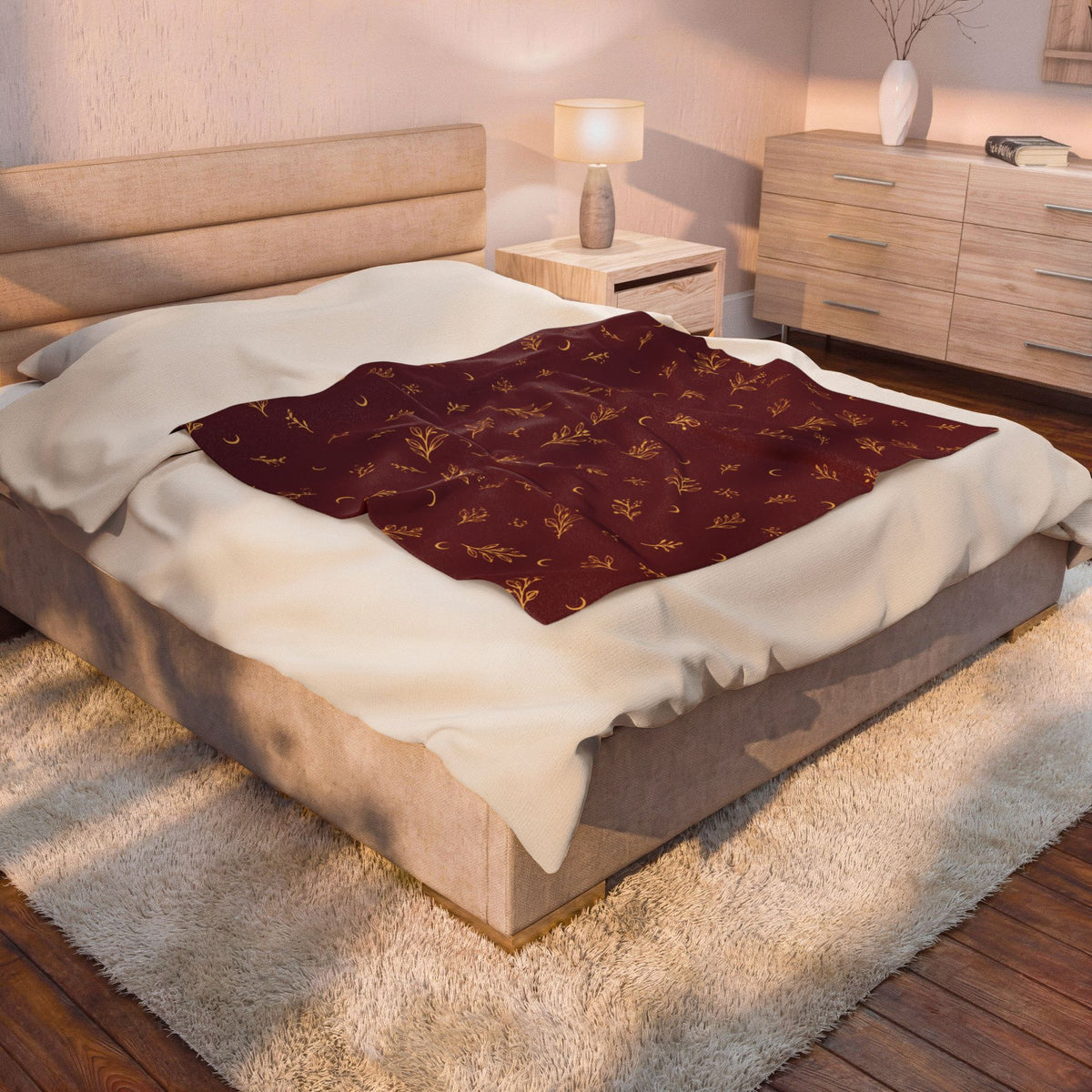 Cranberry Gold plush blanket draped over a bed in a bedroom