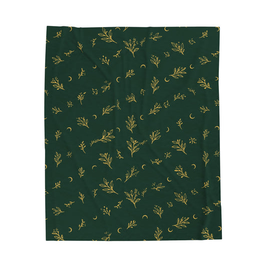 Botanical Gold plush blanket, 50" × 60": deep green with gold botanical sprigs and crescent moons