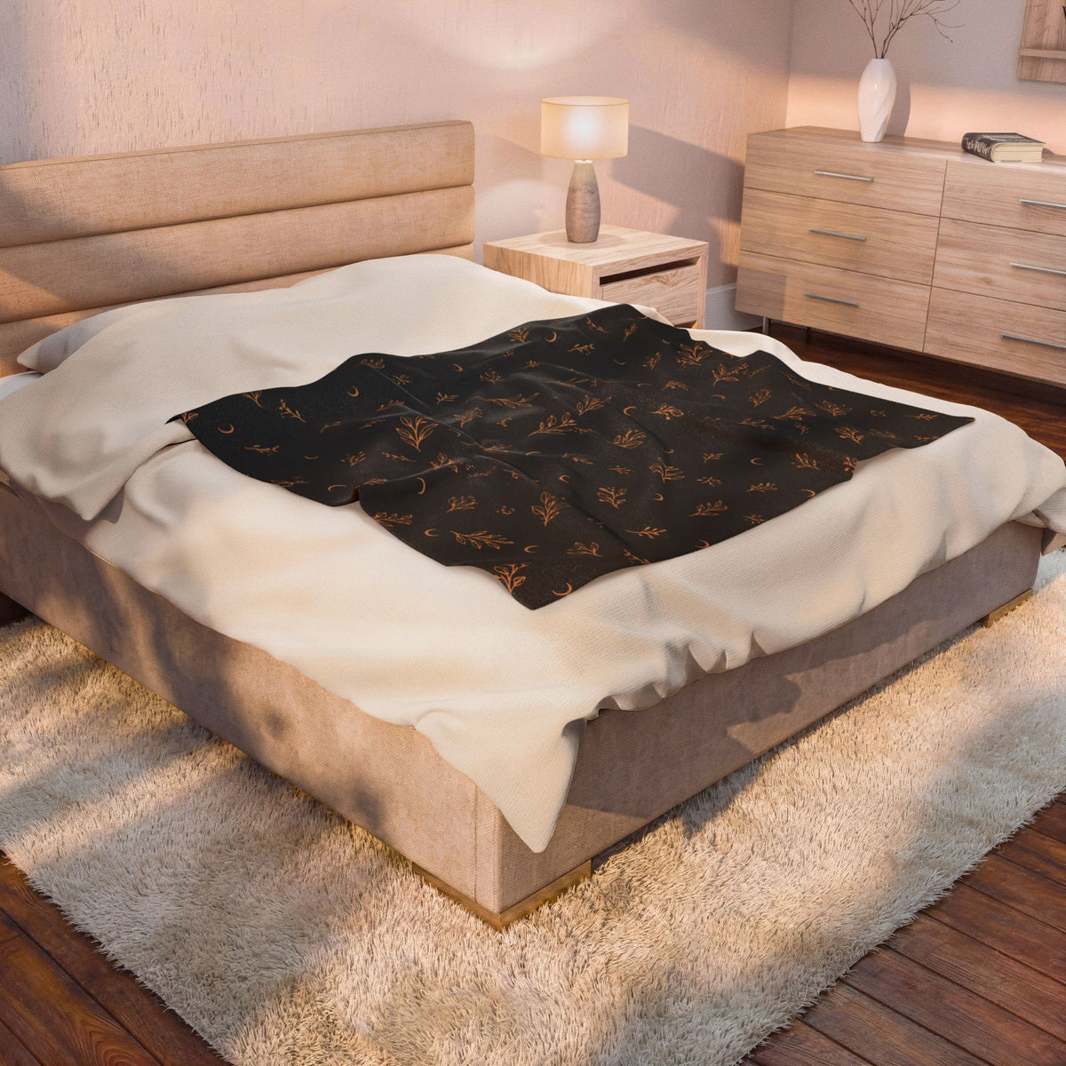 Charcoal Copper plush blanket draped over a bed in a bedroom