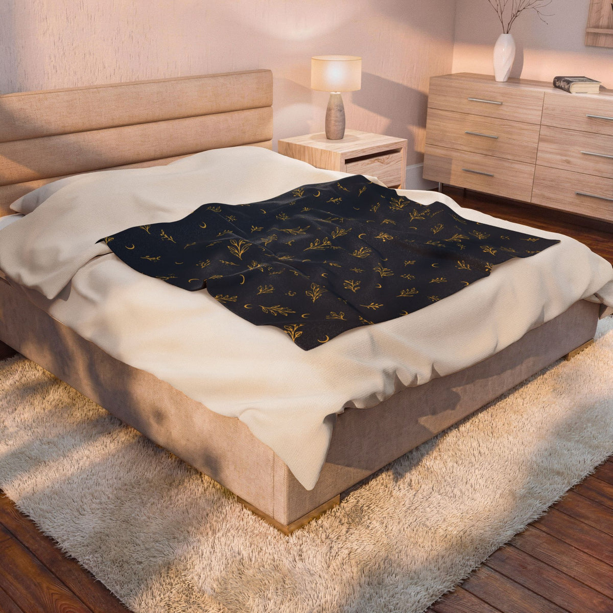 Navy Gold plush blanket draped over a bed in a bedroom